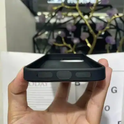 Black protective phone case with bumper guards designed for iPhone models, offering shock resistance and sleek style for everyday protection.