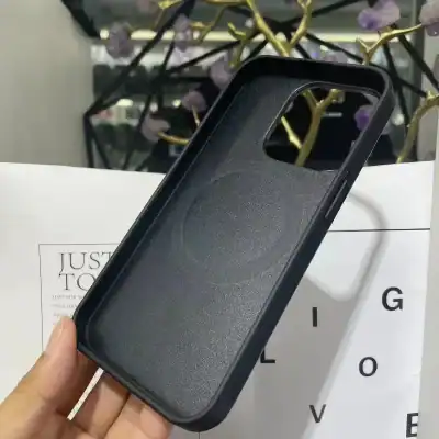 2. Black protective phone case designed for optimal lens and camera protection, lightweight and durable, perfect for iPhone and Android devices.