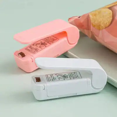 Miniature eye glass and lens cleaner with easy-open cover, designed for quick cleaning of optical glasses and sunglasses.