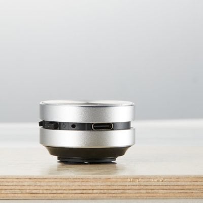 A sleek portable optical device featuring a compact design, USB charging port, and versatile functionality for aesthetic and medical treatments. Perfect for professional use in clinics and medical settings.