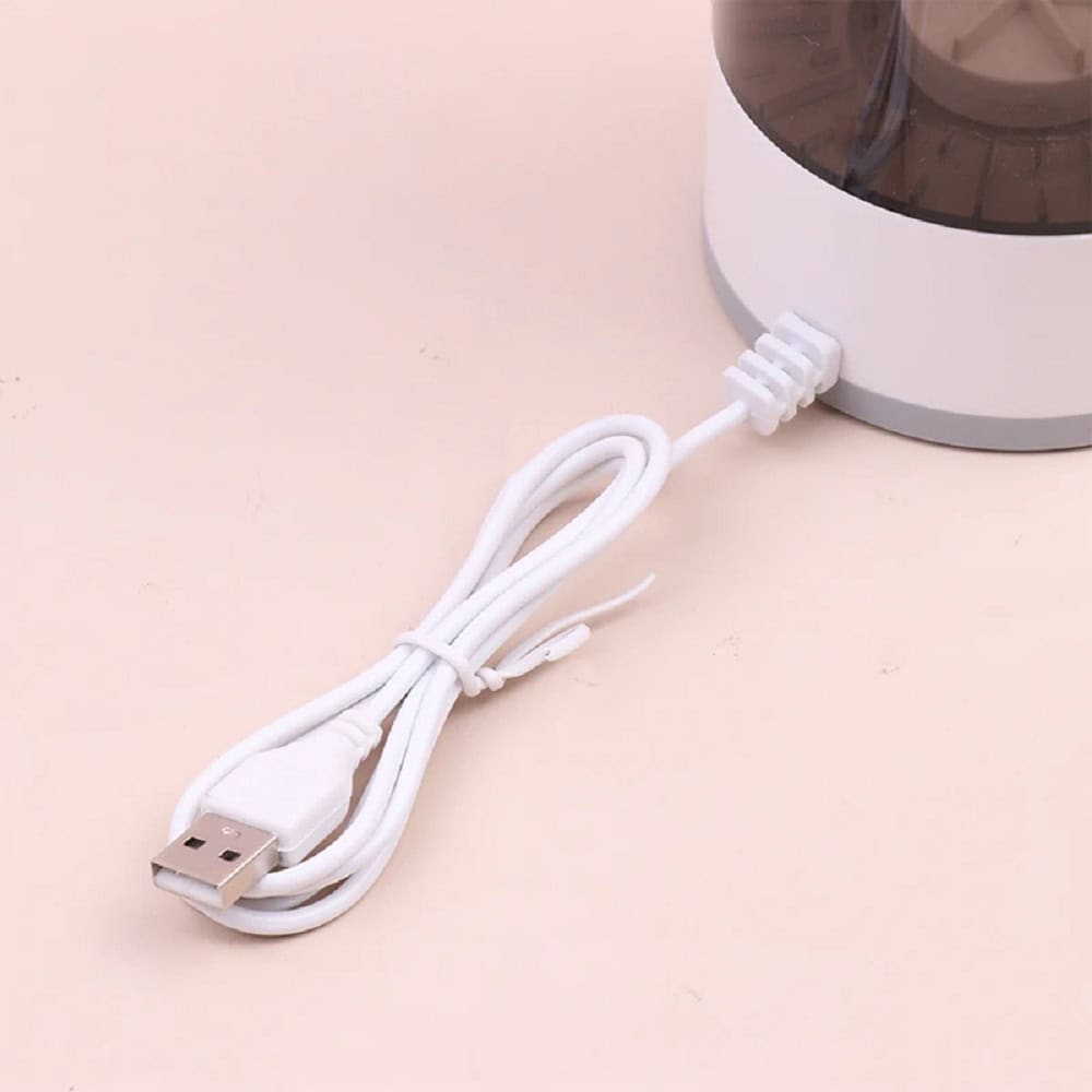 White USB charging cable for Monalisa facial steamer device. Compatible charger for effective beauty and skincare treatments, easy to connect and replace.