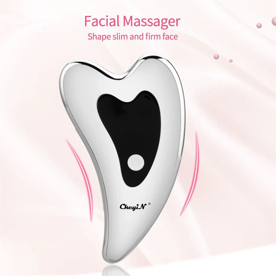 Portable facial massager for skin tightening and face slimming using gentle vibrations. Innovative beauty device promotes a firm, toned, and refreshed appearance. Perfect for skincare routines.