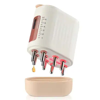 A modern electric oil diffuser with multiple nozzle tips releasing aromatic oils, ideal for home and spa relaxation, featuring adjustable settings for personalized ambiances.