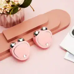 Gentle pink facial massage rollers with metallic balls designed for skin rejuvenation and relaxation. Perfect for enhancing circulation, reducing tension, and elevating your beauty routine with stylish, effective tools from Monalisa Store.