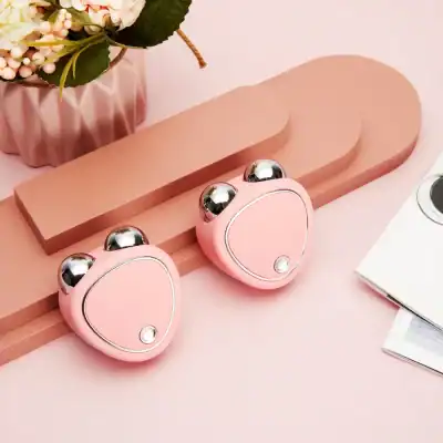 Gentle pink facial massage rollers with metallic balls designed for skin rejuvenation and relaxation. Perfect for enhancing circulation, reducing tension, and elevating your beauty routine with stylish, effective tools from Monalisa Store.