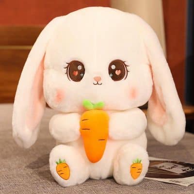 Adorable bunny plush toy holding a bright orange carrot, perfect for children and collectors. Soft, cuddly, and high-quality plush material, making it a delightful gift and decorative item.