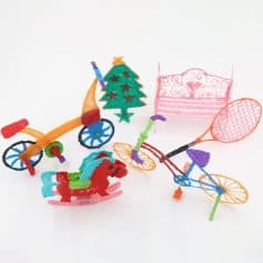 Embroidery toy set featuring children's tricycle, rocking horse, Christmas tree, bed, and tennis racket made with vibrant threadwork for kids' room décor and playful gifts.
