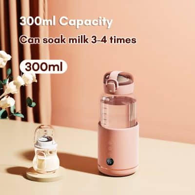 A stylish pink portable milk dispenser with 300ml capacity, suitable for heating and soacking milk 3-4 times, ideal for modern kitchen use.