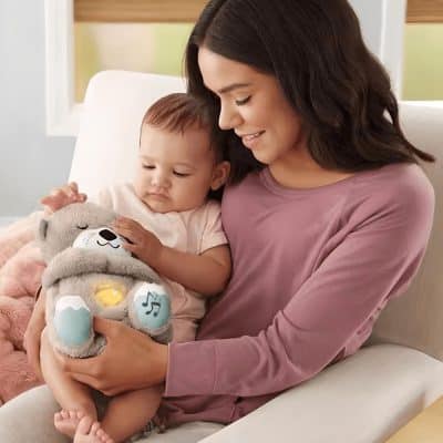Soft, comforting plush toy for kids with lights and sounds to aid learning and sensory development.