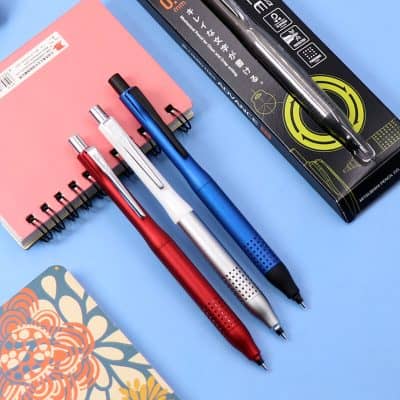 Versatile pens in red, white, and blue with smooth ink flow, ideal for writing, drawing, and taking notes. Plus, a stylish notebook for organizing your ideas at Monalisa Store.