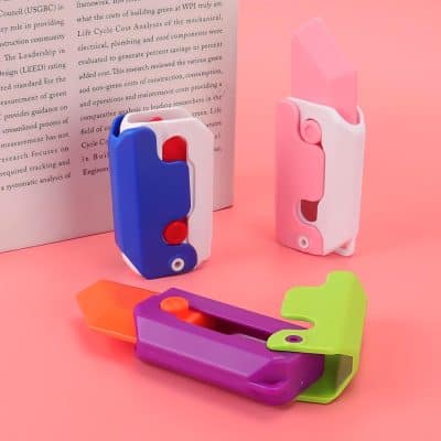 Brightly colored handheld staplers in pink, blue, purple, and green, perfect for office, home, or school. Durable design for secure staples, easy to use, and portable.