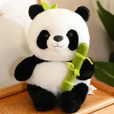 Adorable panda plush toy holding a green bamboo stalk, perfect for kids, gifts, and home decor. Soft, cuddly, and high-quality material for children and collectors alike.