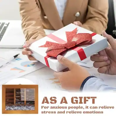 Beautifully wrapped gift box with a red ribbon and bow, highlighting the store's focus on thoughtful gifting and customer service for opt and wellness products.