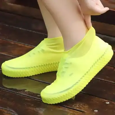 Vivid yellow slip-on sneakers with breathable material, comfortable sole, perfect for casual wear and active lifestyles.