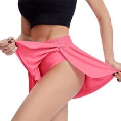 Chic pink yoga skirt ideal for comfortable workouts, active lifestyle, and casual wear. Made from high-quality fabric with a stylish design, perfect for fitness, yoga, and athleisure fashion.