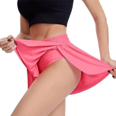 Chic pink yoga skirt ideal for comfortable workouts, active lifestyle, and casual wear. Made from high-quality fabric with a stylish design, perfect for fitness, yoga, and athleisure fashion.