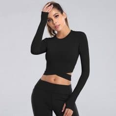 High-quality black crop top with long sleeves, perfect for trendy fashion and everyday wear. Comfortable fit for all-day use, ideal for casual outfits or fitness activities.