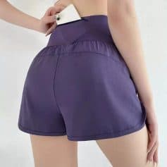 High-quality purple athletic shorts designed for women, featuring an elastic waistband, lightweight breathable fabric, and a stylish fit. Ideal for sports, running, gym, or casual outings, available at Monalisa Store.
