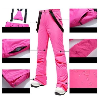 Waterproof pink ski pants with adjustable suspenders, snow-resistant fabric, and breathable material for winter sports enthusiasts.