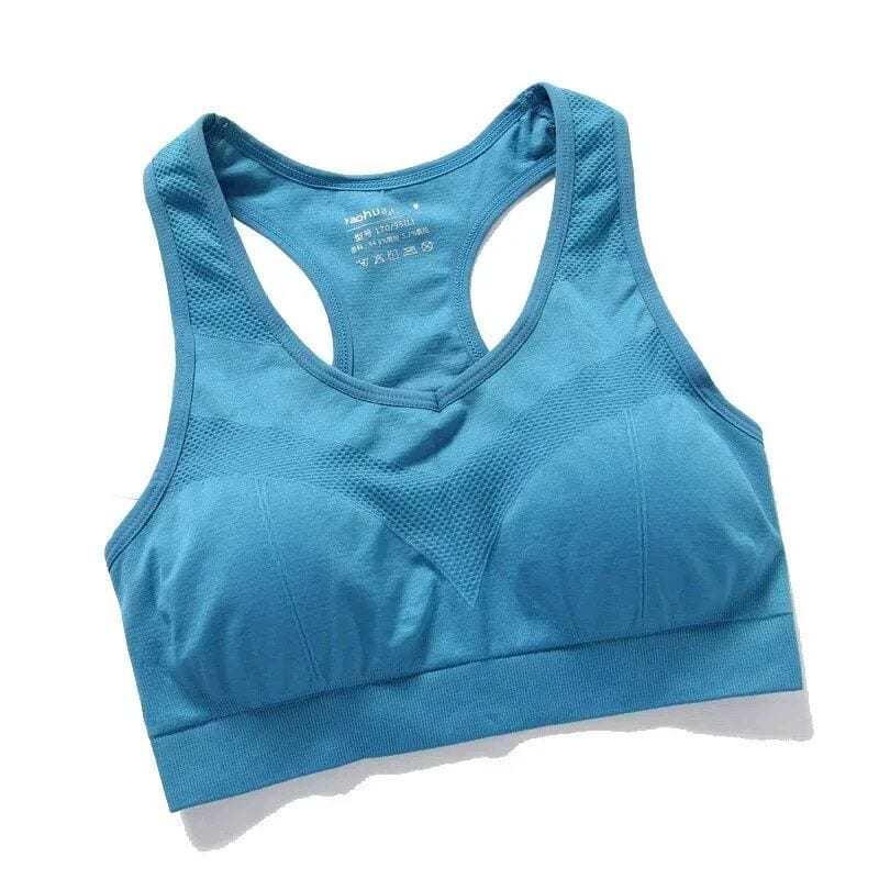 Blue athletic sports bra for women, seamless design, breathable fabric, perfect for workout and fitness activities.