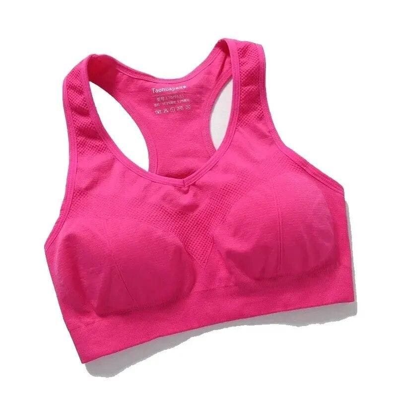 Comfortable pink sports bra with breathable fabric, ideal for workouts and active lifestyles. Perfect for women seeking support and style in fitness apparel.