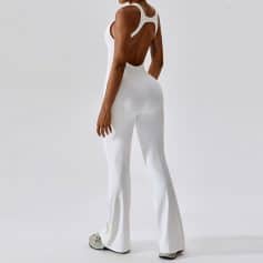 High-quality white open-back jumpsuit for fashionable and comfortable wear. Perfect for casual, social, or workout settings. Elegant design with a flattering fit.