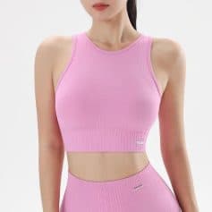 Comfortable pink athletic crop top for women with seamless design, ideal for gym, yoga, and activewear. Stylish and breathable for fitness enthusiasts.