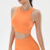 High-quality orange athletic crop top and matching leggings for women, perfect for workouts, yoga, and active lifestyles. Stylish, comfortable, and durable sportswear from Monalisa Store.