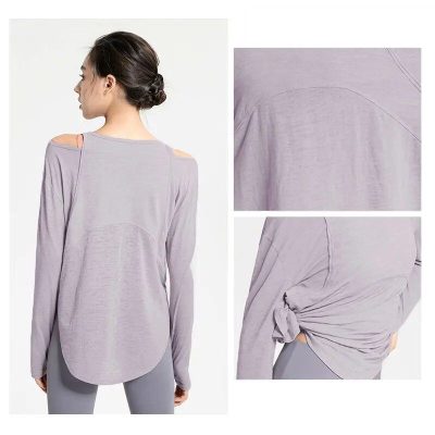 Comfortable and stylish gray lounge top with unique shoulder cutouts and knot detail. Perfect for casual wear, combines fashion and comfort for everyday style.