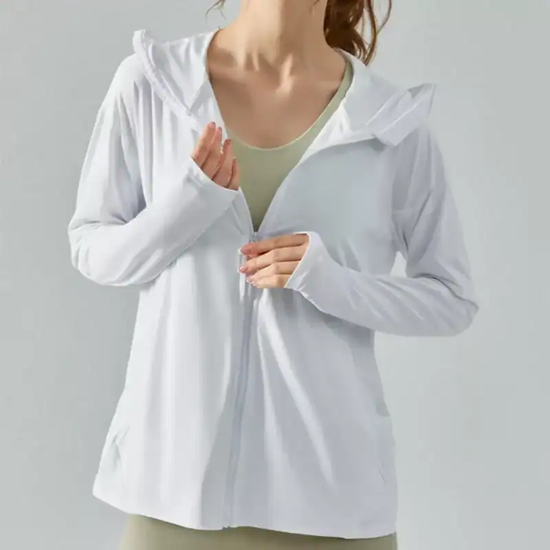 Comfortable white zip-up hoodie for women, ideal for casual wear and outdoor activities. Features a trendy design, soft fabric, and functional pockets for everyday use and enhanced style.