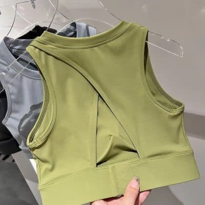 High-quality olive green sports bra perfect for workouts and activewear. Breathable fabric with comfortable fit, ideal for fitness, yoga, and gym sessions.
