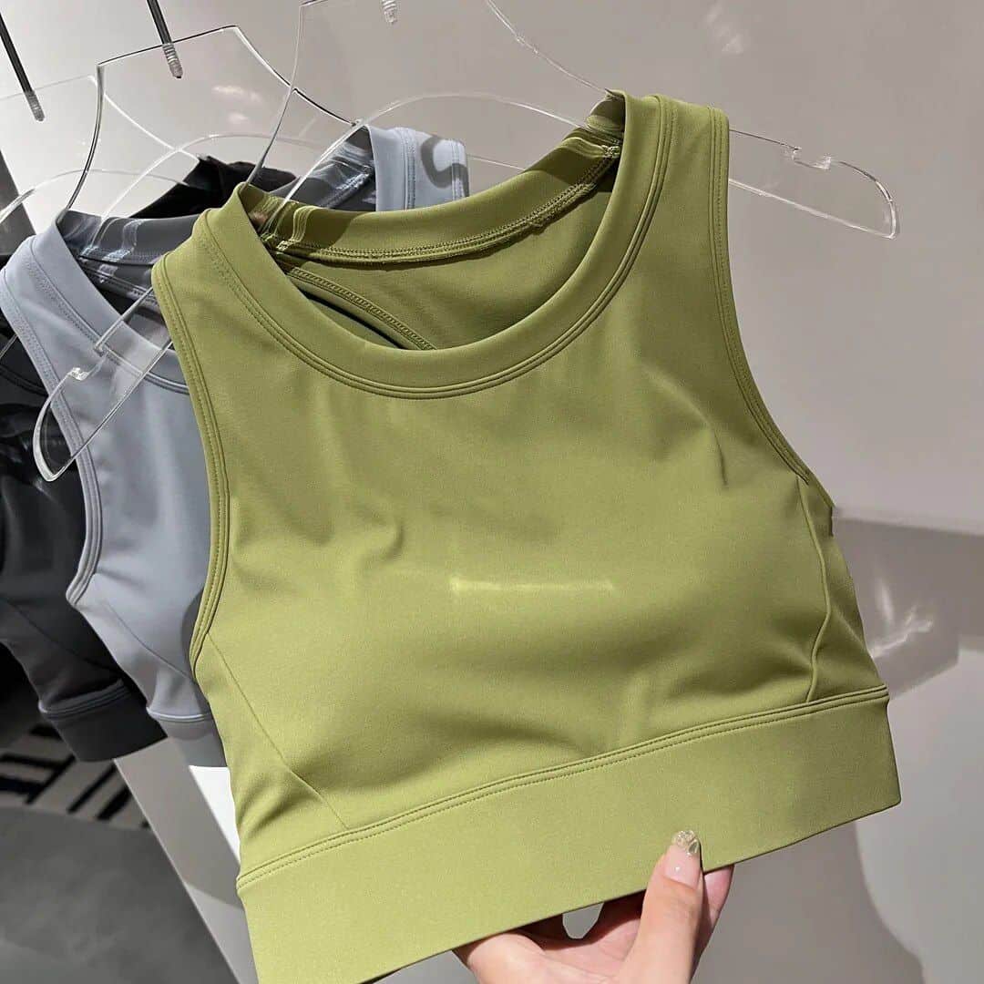 Comfortable lime green sports bra, perfect for workouts and activewear, made from high-quality breathable fabric for optimal support.