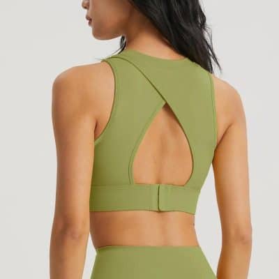 Lightweight green sports bra with stylish back cutout for activewear and gym workouts. Comfortable fit, breathable fabric, perfect for fitness enthusiasts.