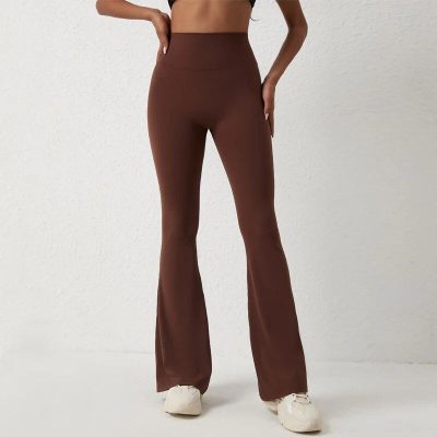 High-waisted brown flare pants perfect for casual and trendy fashion looks. Comfortable fit, versatile style, ideal for everyday wear or dressing up.
