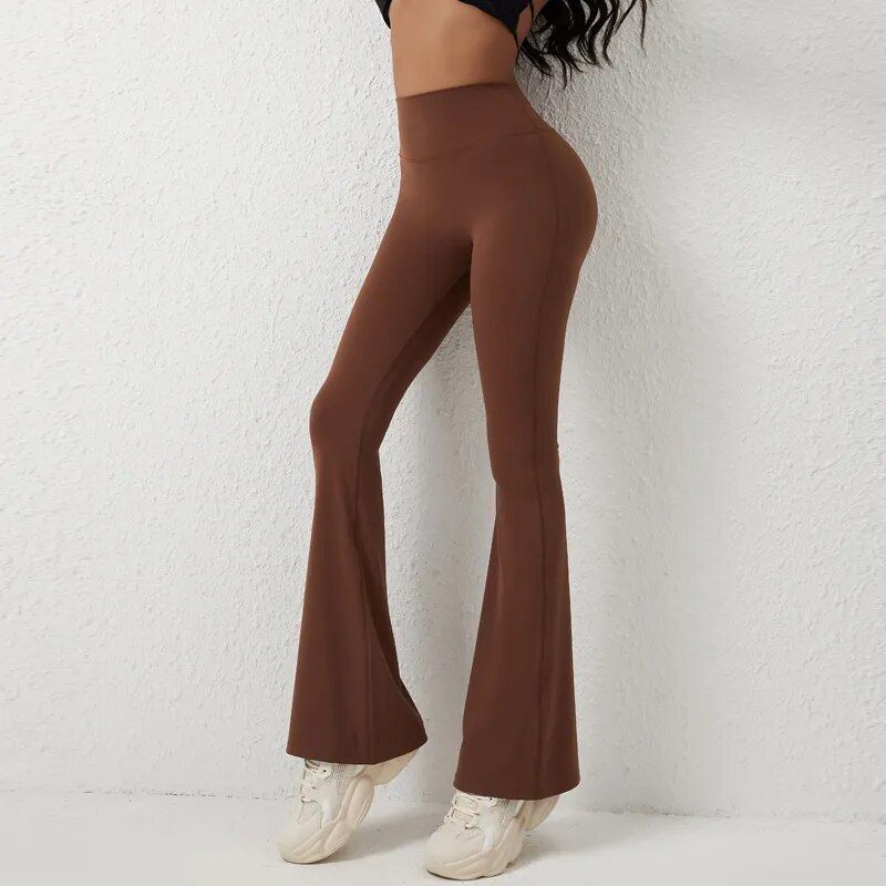Stylish high-waisted brown flared pants for women, perfect for casual or fashionable outfits. Made from comfortable, stretchy fabric for a flattering fit and trendy look.
