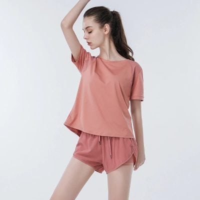 Stylish women's loungewear set featuring a comfortable pink top and matching shorts, perfect for relaxation and casual wear. Shop Monalisa Medical for high-quality, fashionable sleepwear and leisurewear accessories.
