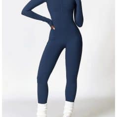 Comfortable navy blue full-body athletic jumpsuit with full zip, designed for fitness, yoga, and gym workouts. Slim fit, breathable fabric, with ankle socks and sneakers included.