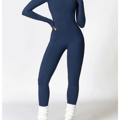 Comfortable navy blue full-body athletic jumpsuit with full zip, designed for fitness, yoga, and gym workouts. Slim fit, breathable fabric, with ankle socks and sneakers included.