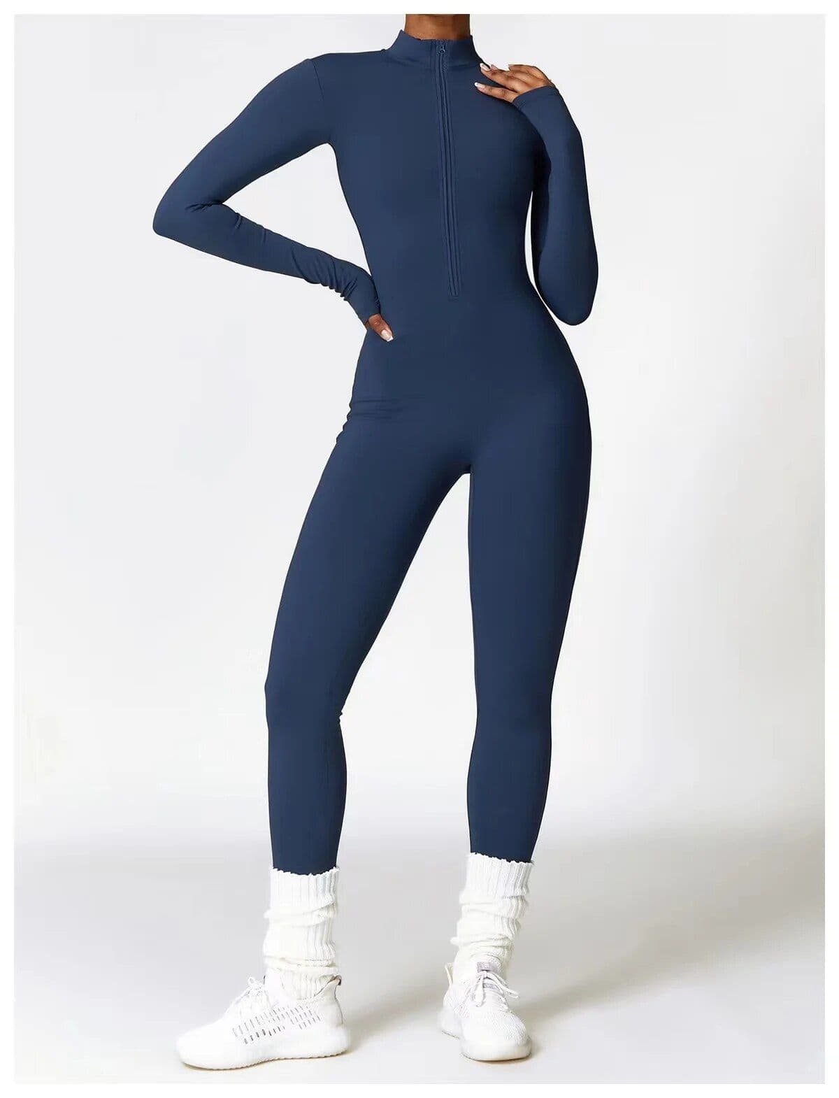 Comfortable navy blue full-body athletic jumpsuit with full zip, designed for fitness, yoga, and gym workouts. Slim fit, breathable fabric, with ankle socks and sneakers included.