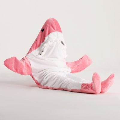 Soft plush shark toy, perfect for children, featuring pink and white colors, adorable design, and cuddly texture for comfort and play.