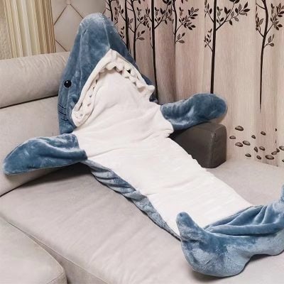 Soft shark plush blanket perfect for cozy naps and home decor, featuring a playful shark design with detailed fins and a friendly face. Ideal for children and animal lovers.
