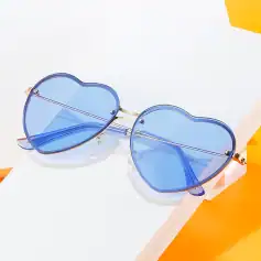 Stylish heart-shaped sunglasses with blue tinted lenses and gold accents, perfect for summer fashion, UV protection, and trendy eyewear choices.