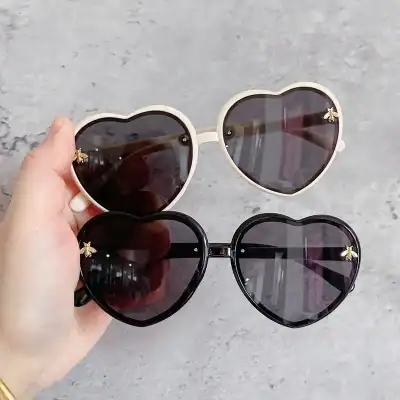 Elevate your style with heart-shaped sunglasses featuring butterfly details, ideal for women seeking fashionable eyewear at Monalisa Store. Shop now for trendy sunglasses.