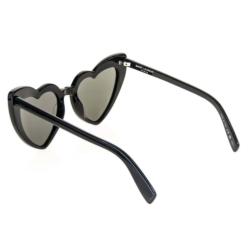 Stylish black heart-shaped sunglasses with tinted lenses, perfect for fashion and sun protection, available at Monalisa Store for a trendy look.