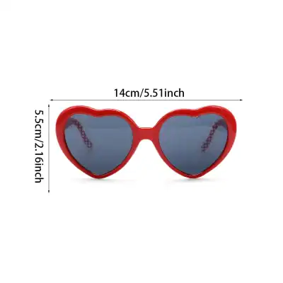 Heart-shaped sunglasses for women with UV protection, stylish design, and shaded lenses, ideal for summer, beach outings, and fashion statements.