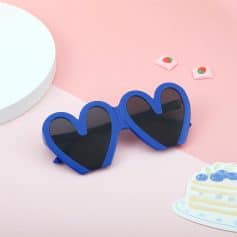 Bright blue heart-shaped kids' sunglasses with dark lenses, perfect for trendy children’s eyewear.