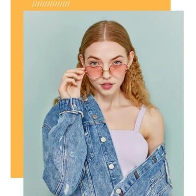 Pink sunglasses with trendy frame perfect for fashion-forward women and UV protection. Ideal for adding a chic touch to your summer style.