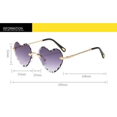 Stylish heart-shaped sunglasses with gradient lenses, gold accents, and comfortable arm design, perfect for fashionable optical accessories.