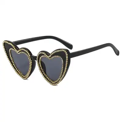 Glamorous heart-shaped sunglasses decorated with rhinestones, ideal for fashion accessories, statement eyewear, and trendy sunglasses collection.
