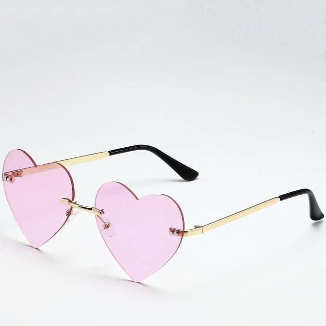 Heart-shaped pink sunglasses with stylish gold arms and black temple tips, perfect fashionable eyewear for women and teens, available at Monalisa Store.